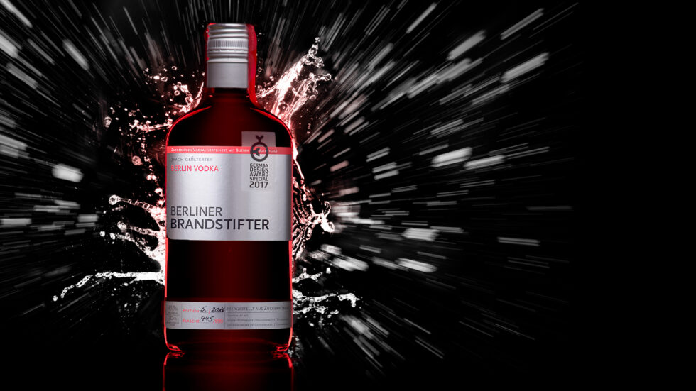 explosive product photo of a vodka bottle