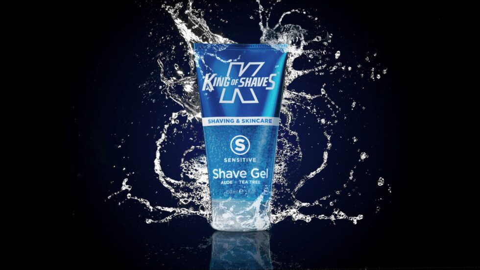 Product photo of a bottle of shaving gel with splashes